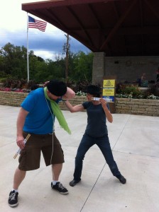 Jessie as Antipholus of Syracuse, practicing some violence with Christopher Elst as Dromio of Ephesus